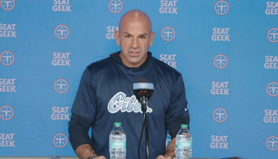 Titans Coach Wears Gibbs High Sweatshirt