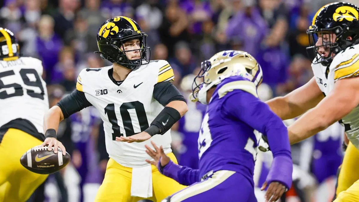 Iowa beats Washington 38-21 in offensive clinic