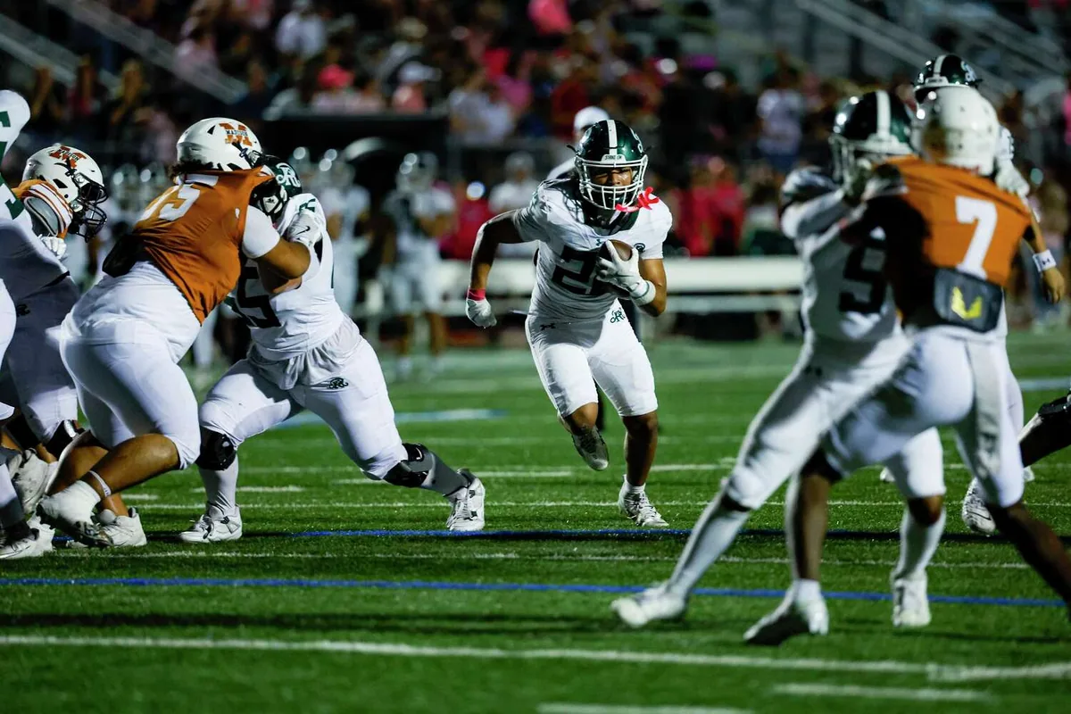 Reagan edges Madison with Fernandez' 189-yard game