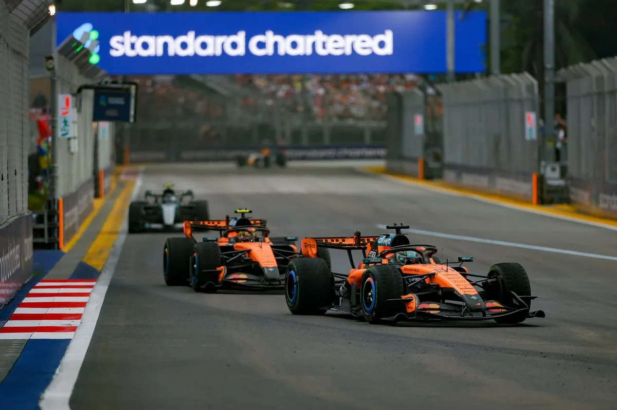 Norris faces penalty after contact with Piastri in Singapore sprint
