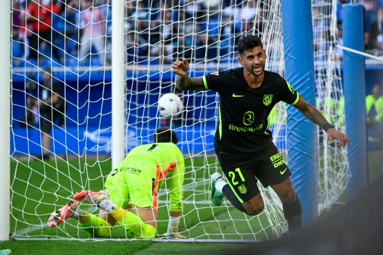 Atletico edges Alaves with late goal