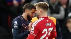 Spurs draw with United after red card