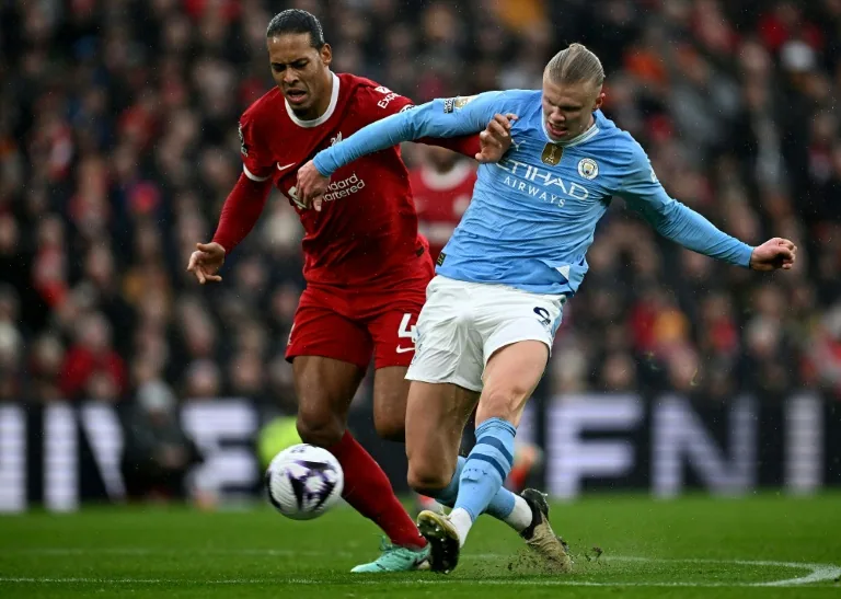 manchester city face anfield after financial penalty
