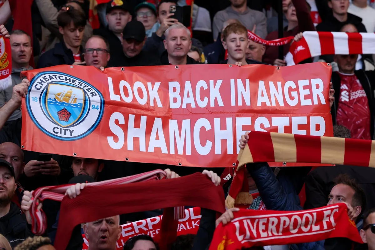 Man City fans bring inflatable bananas to Liverpool match