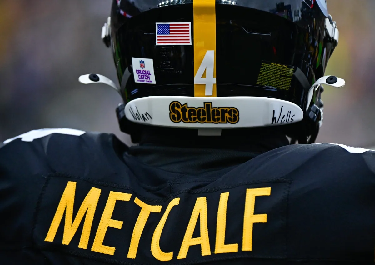 Metcalf Honors Teenager on Helmet