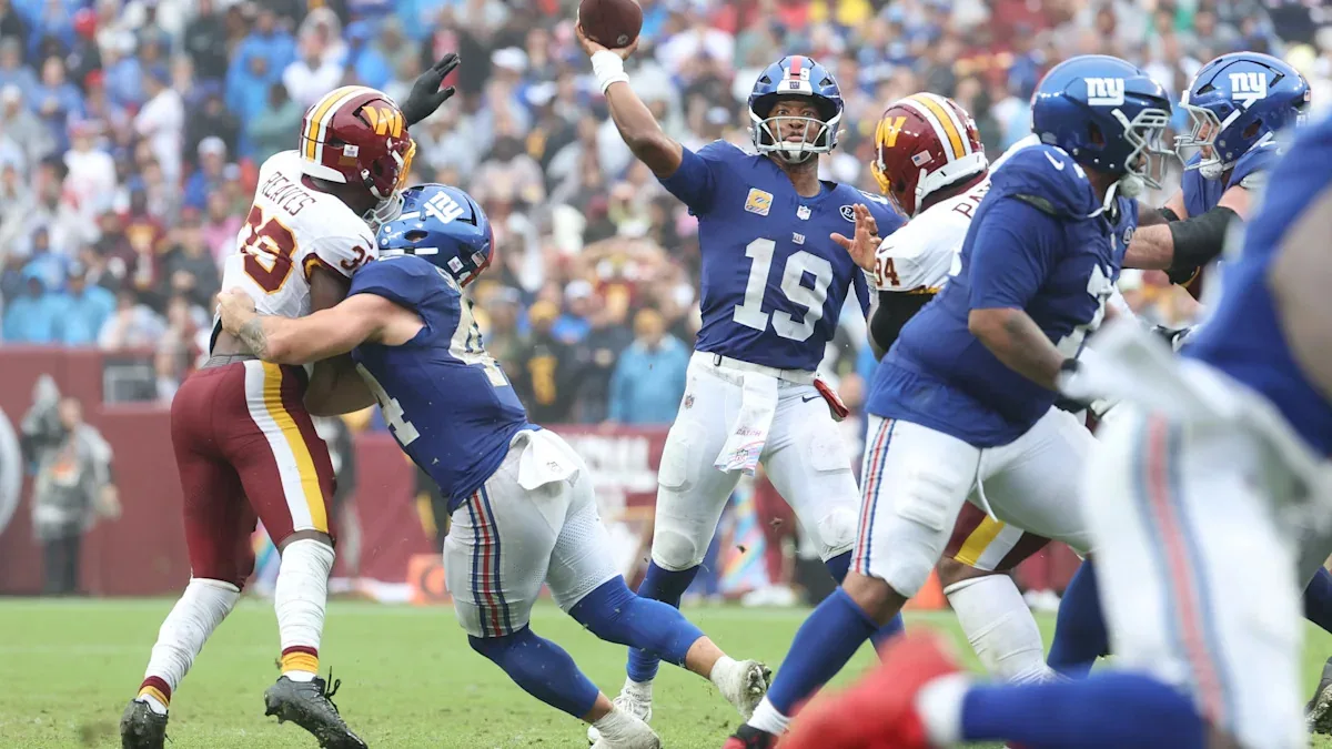 Eagles stay in NFC East race after tie
