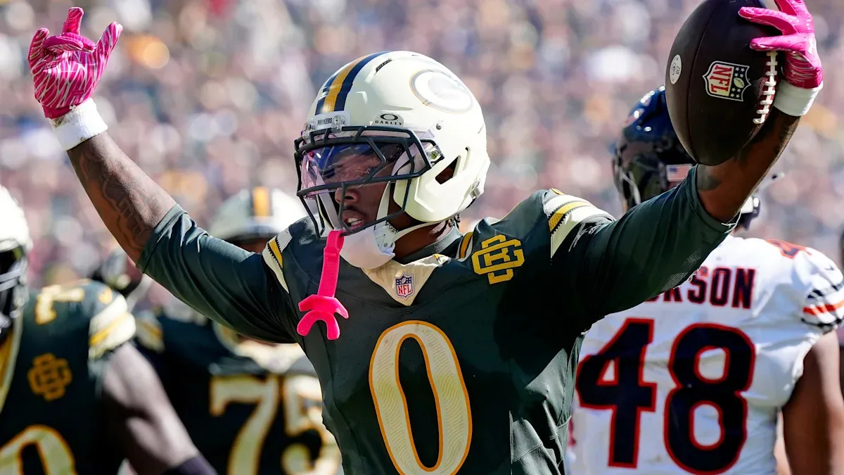 Golden hits 100 yards in Packers' win