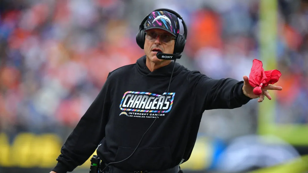 Harbaugh's error costs Chargers in Broncos loss