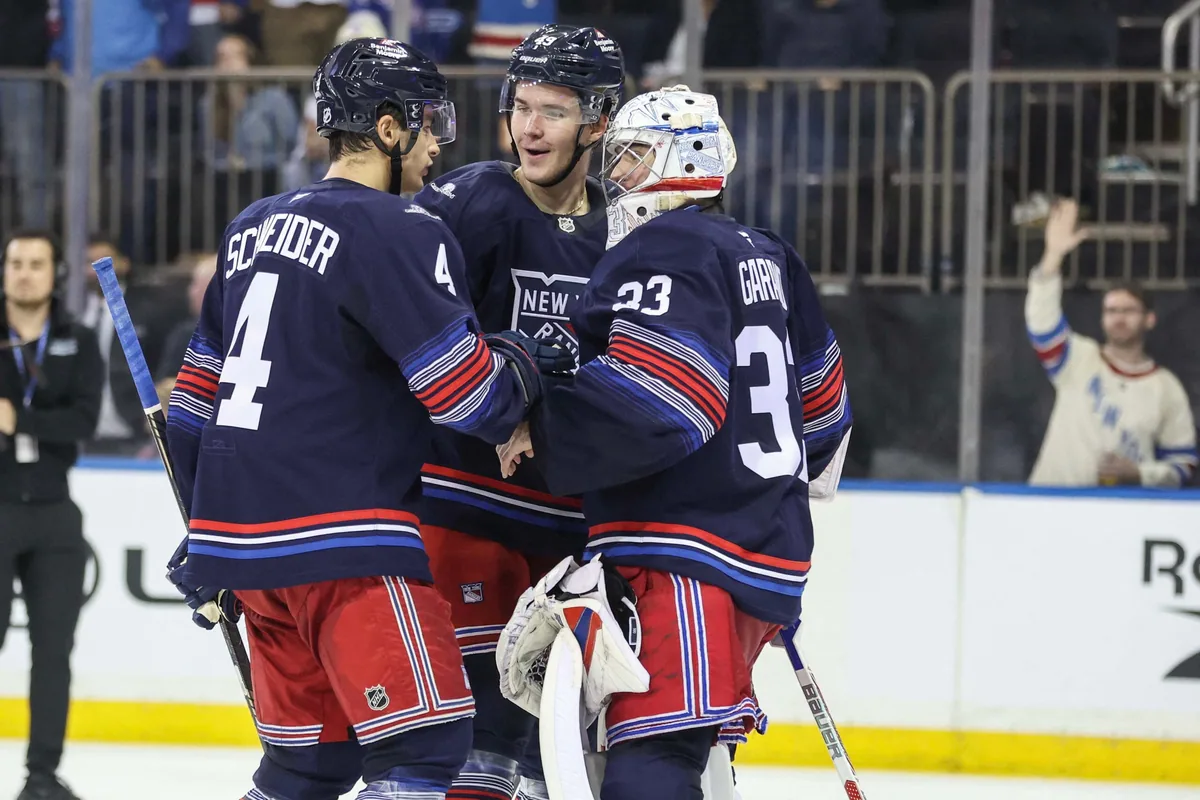 Rangers dominate Canucks in early season rout