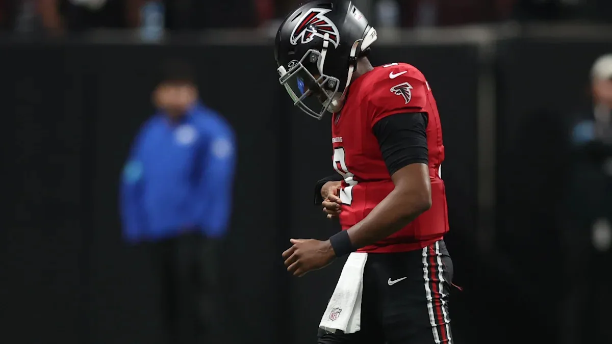 Penix exits game with rib injury